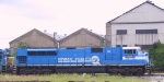 CSX 811 leads a train into the yard